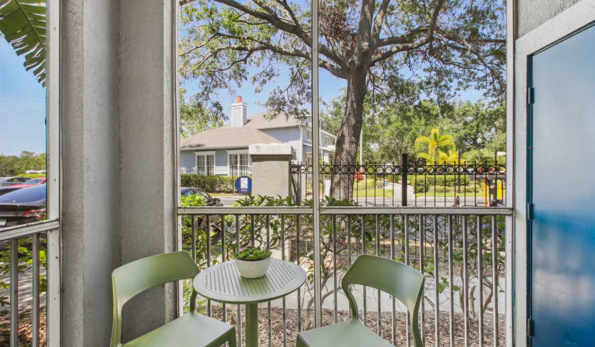 Peaceful screened-in patio for enjoying this pet-friendly community at Sole at Citrus Park apartments in Tampa, Florida