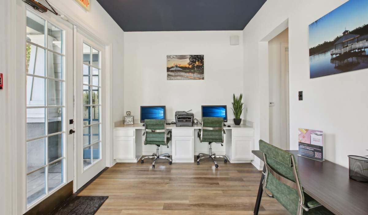 Business center offering computer and printer access for residents at Sole at Citrus Park apartments in Tampa, Florida