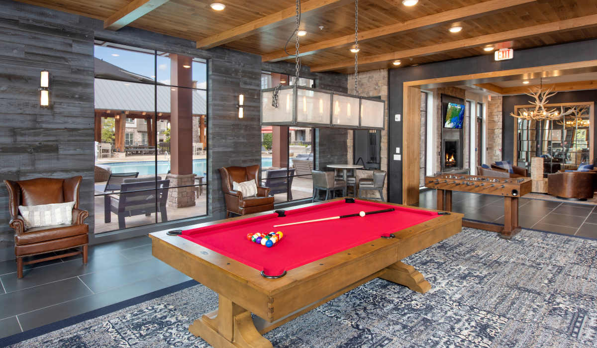 Game room with pool table at Timberline View in Buford, Georgia