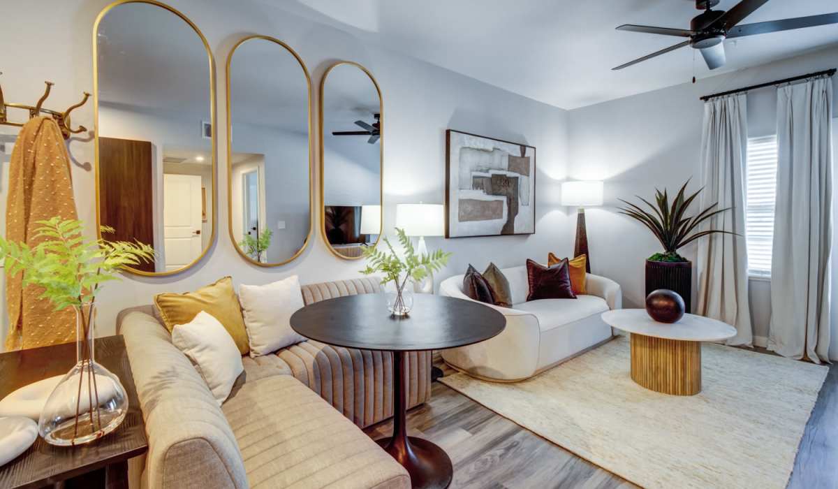 Living room with wood-style flooring at Aurora at Green Valley in Fairfield, California