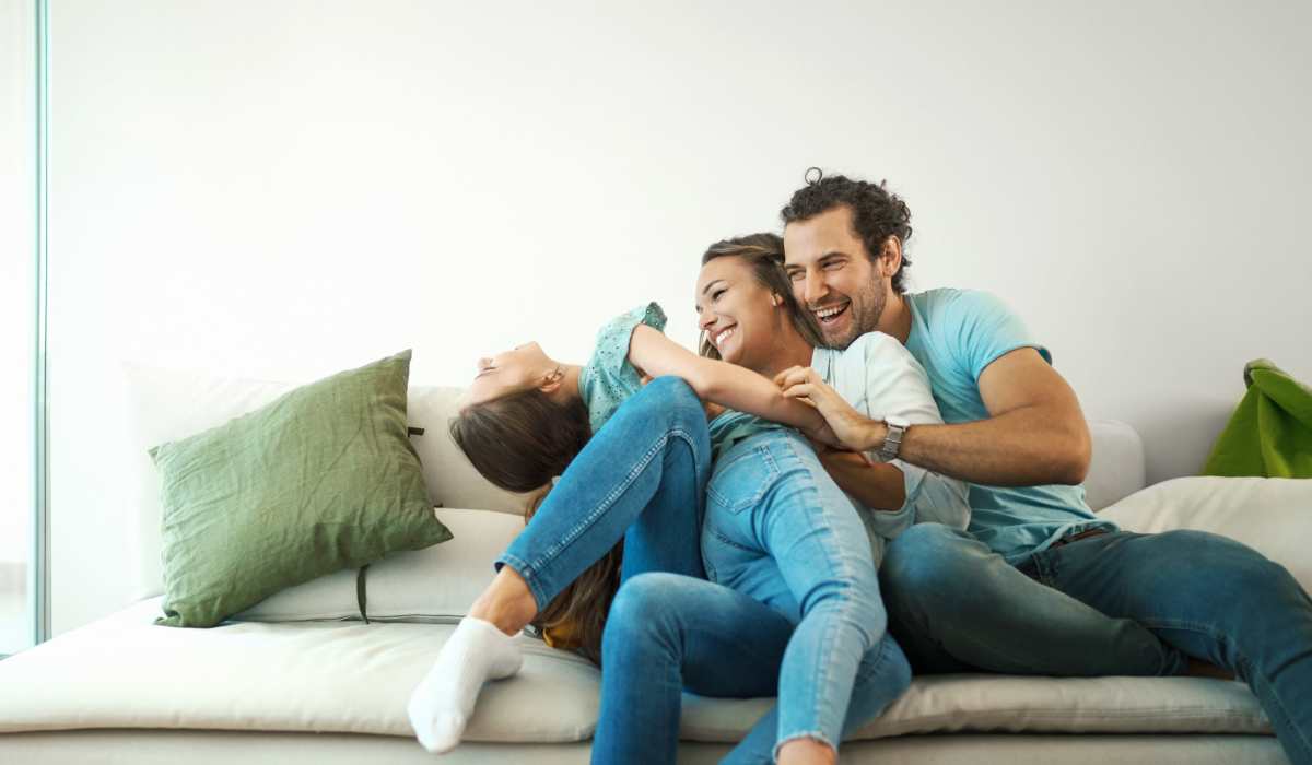 A happy family in their apartment home at Park Terrace Apartment Homes in Muskegon,Michigan