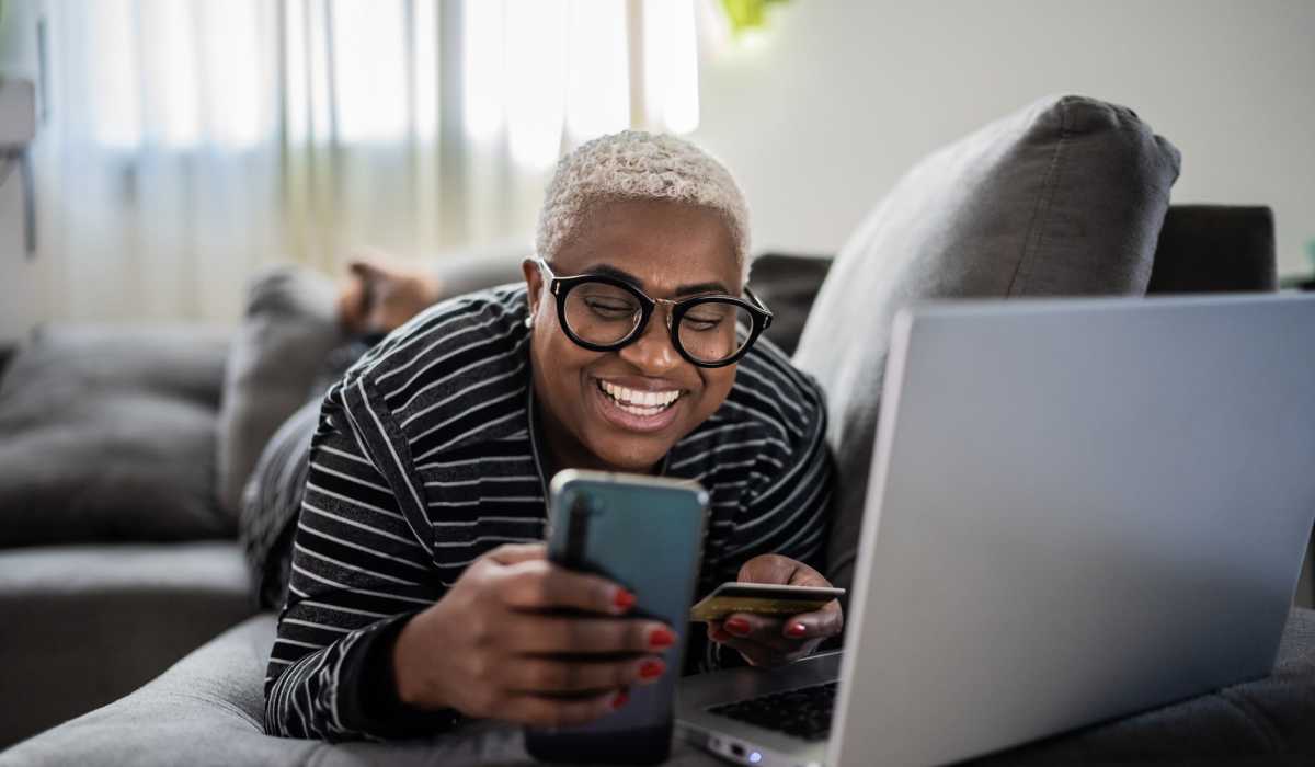 Woman working on her laptop at Park Terrace Apartment Homes in Muskegon,Michigan