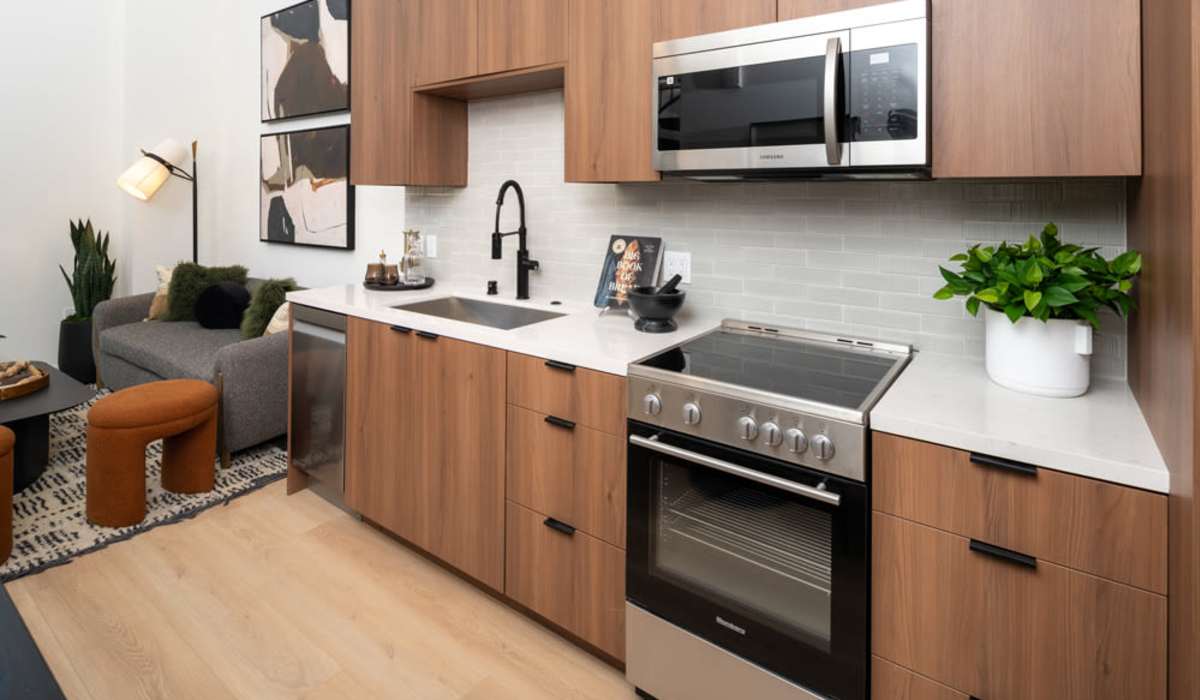 Studio kitchen with view to dining area at Vivien in Los Angeles, California