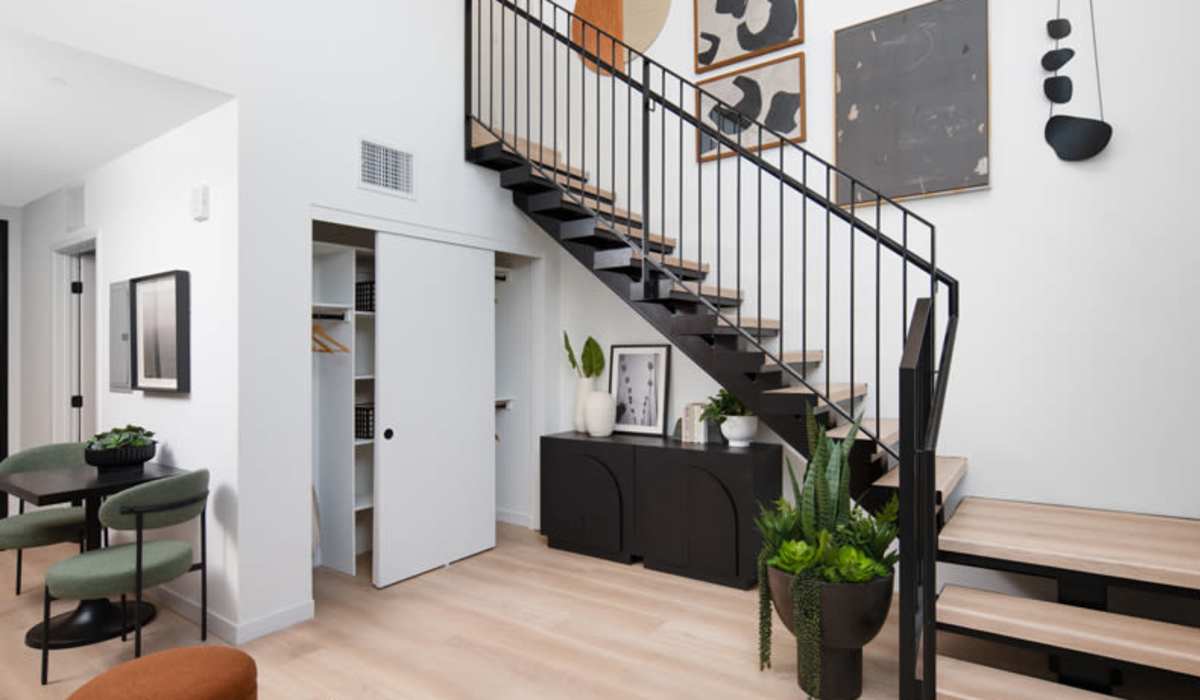 Staircase going from living room at Vivien in Los Angeles, California