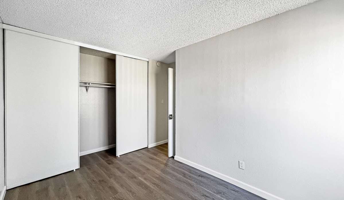 Bedroom with walk-in closet at Village of the Pines in Reno, Nevada