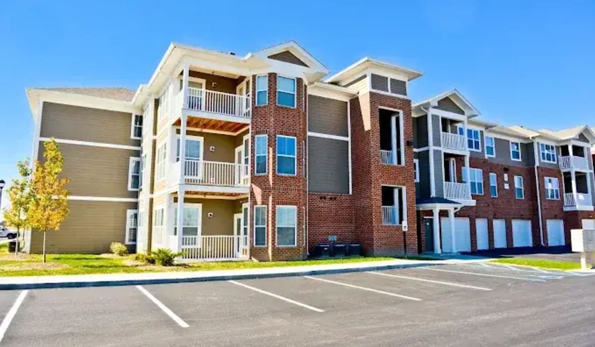 Lots of parking in the welcoming neighborhood at Burkart Crossing Apartments in Seymour, Indiana