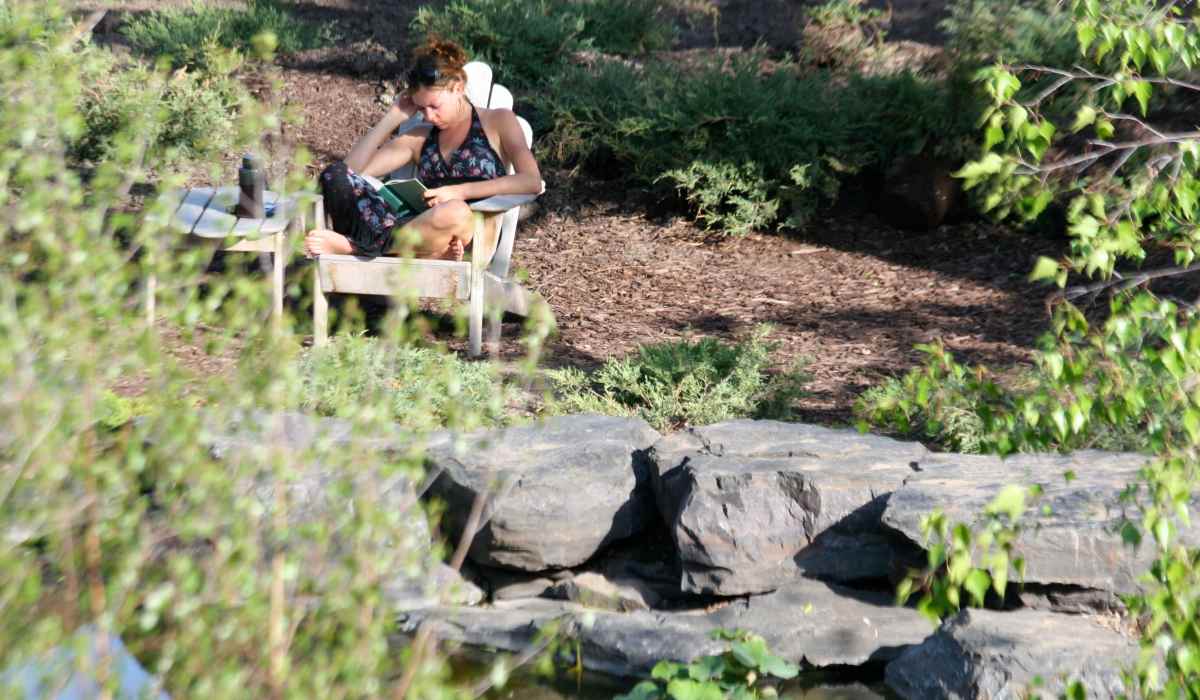 Relax outdoors by the pond at Cedars of Edina in Edina, Minnesota