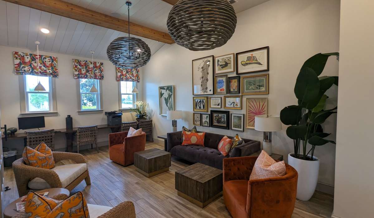 Clubhouse with comfortable couch at Cottages of Schillinger Pointe in Mobile, Alabama