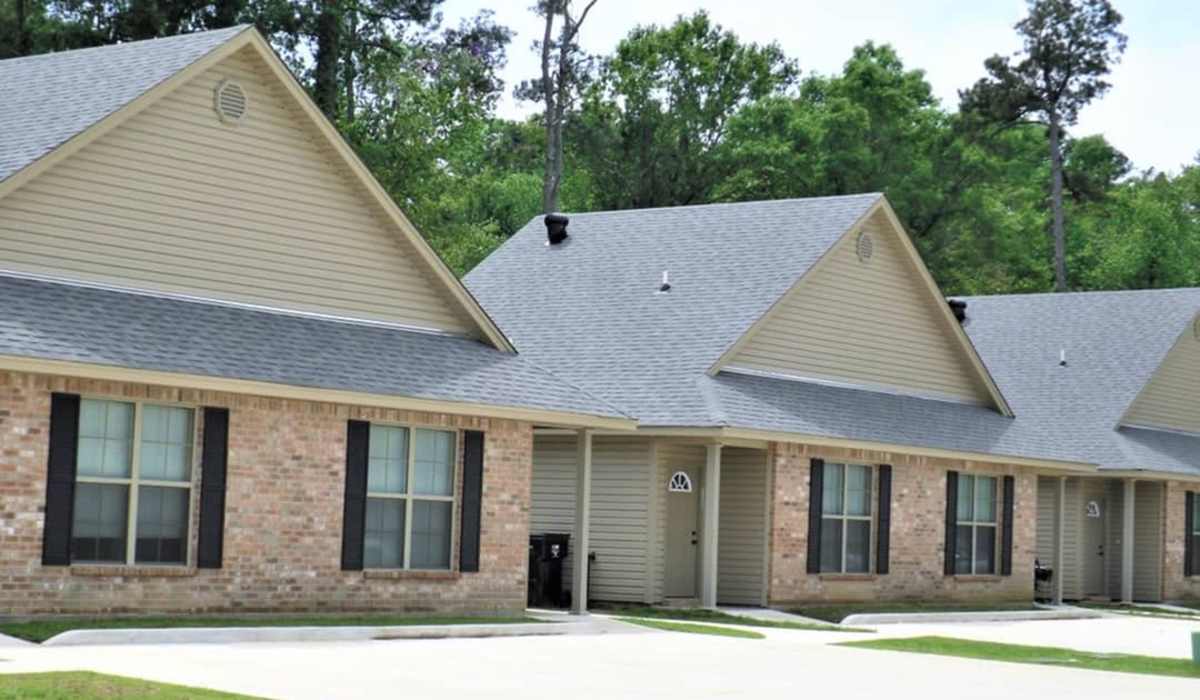 Community building exterior view at Tangi Lakes in Hammond, Louisiana