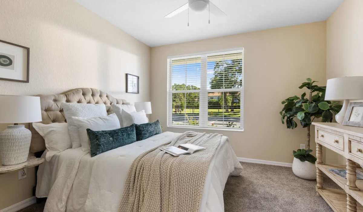 Bedroom with window  at The Residences at Creighton Waterway in North Port, Florida