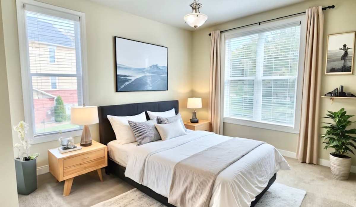 Bedroom with natural light at Palisades of Belmont in Belmont, North Carolina