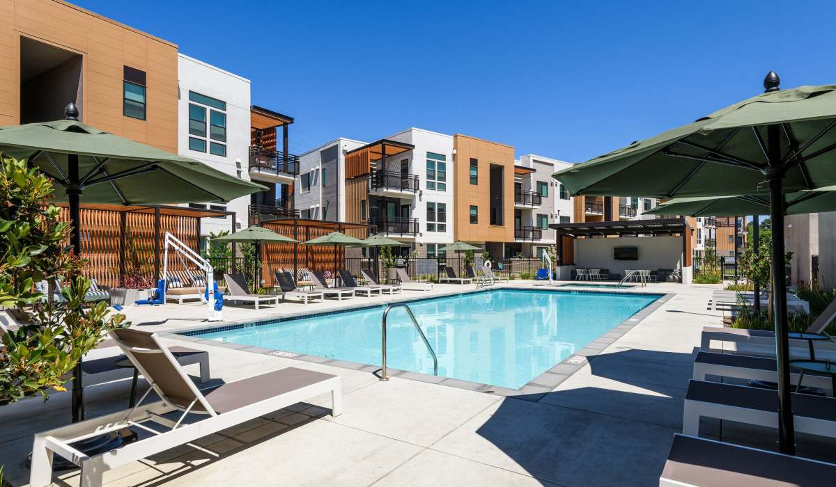 Pool and seating at Phase 2 of Sutter Green Apartments in Sacramento, CA