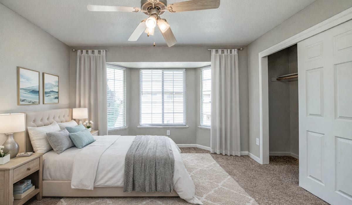 Spacious bedroom with carpet flooring at Coventry Cove in Clovis, California