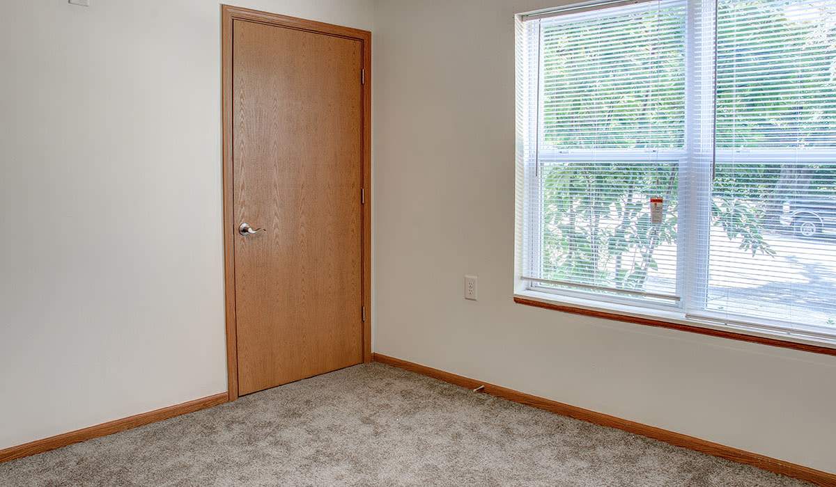 Bedroom with a window at City View Place in Richmond, Virginia