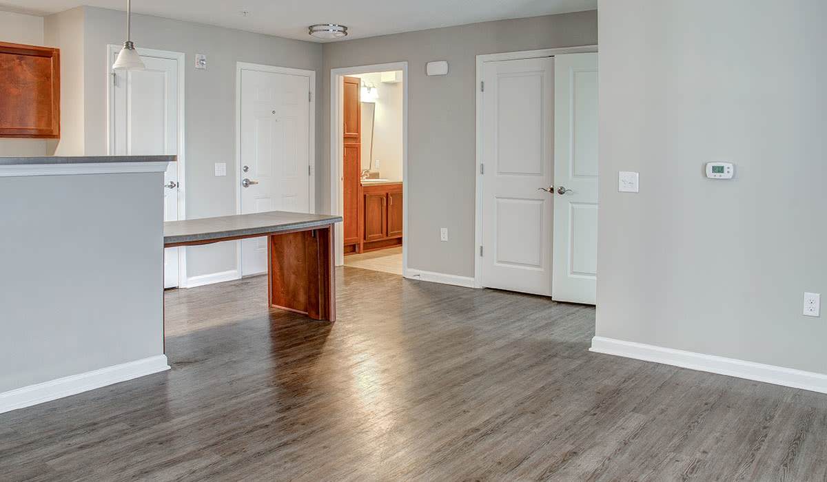 View of the kitchen and doors leading to bedrooms at Brennan Pointe I in Newport News, Virginia