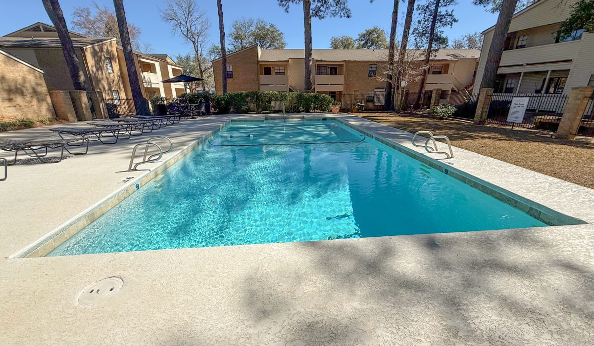 Large community swimming pool at Country Club Place in Marshall, Texas