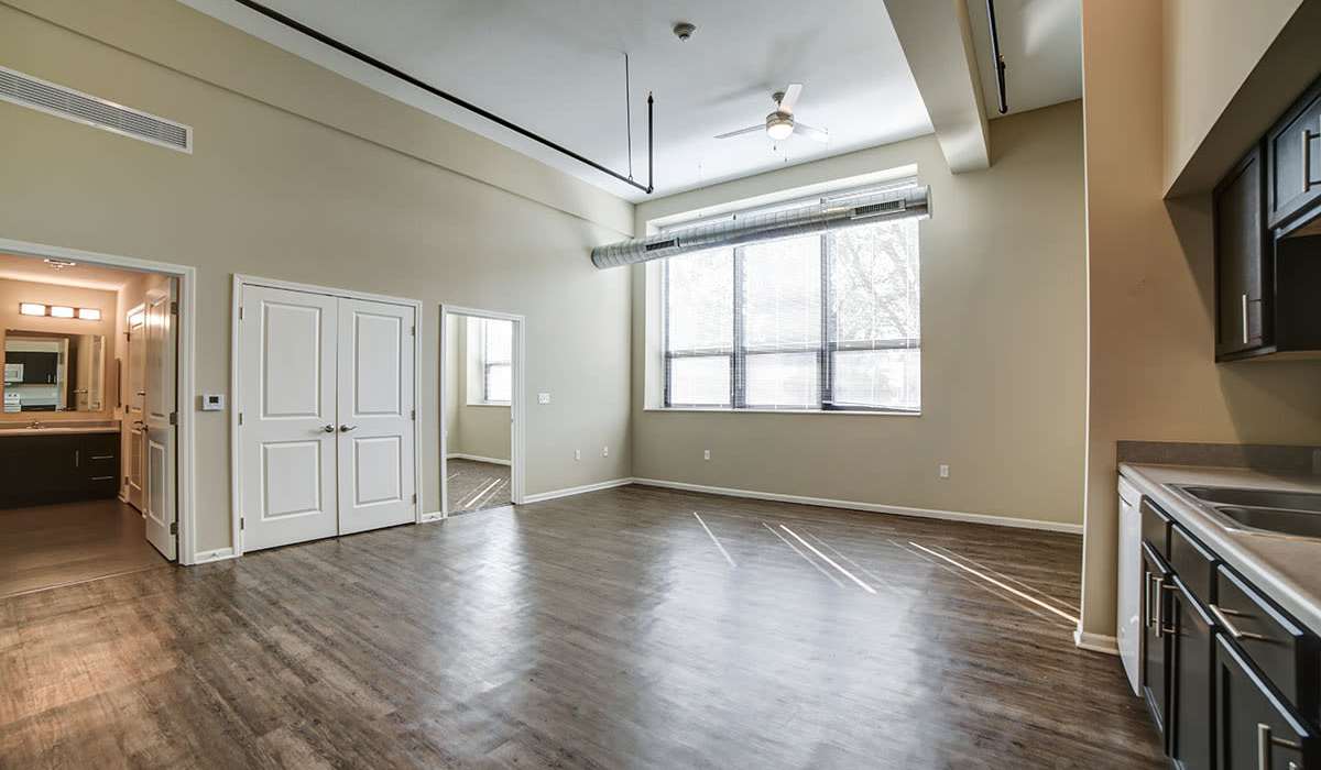 Living area beside open kitchen at Willow Commons Apartments in Erie, Pennsylvania