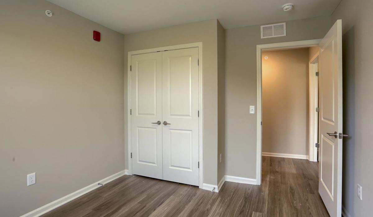 Bedroom with walk-in closet at Normandy Lofts in Shippensburg, Pennsylvania