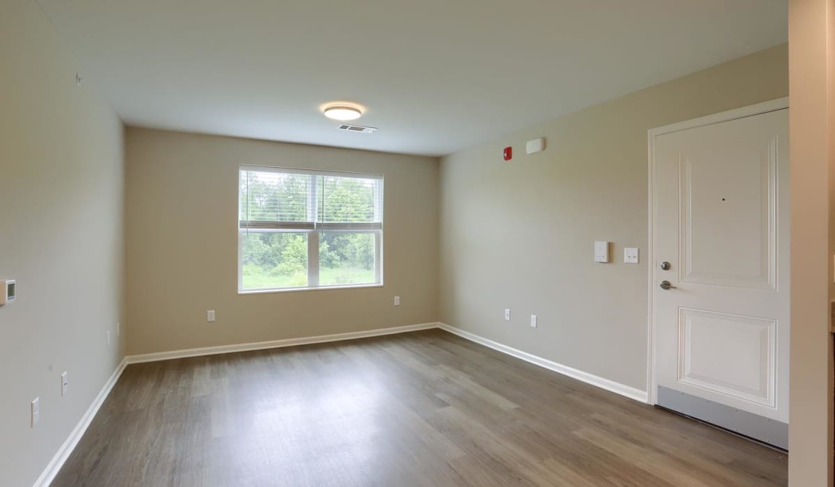 Living room with LVT flooring at Normandy Lofts in Shippensburg, Pennsylvania