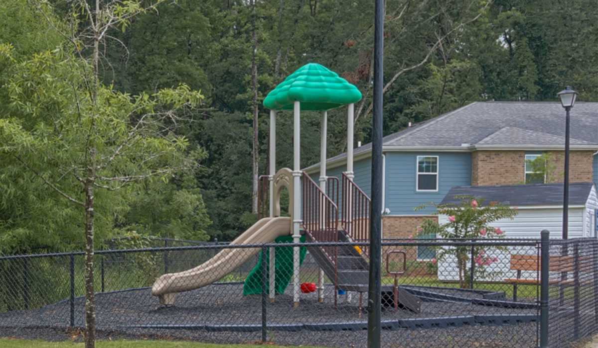 Playground with slide and climbing structure at Lowcountry Crossing in Denmark, South Carolina