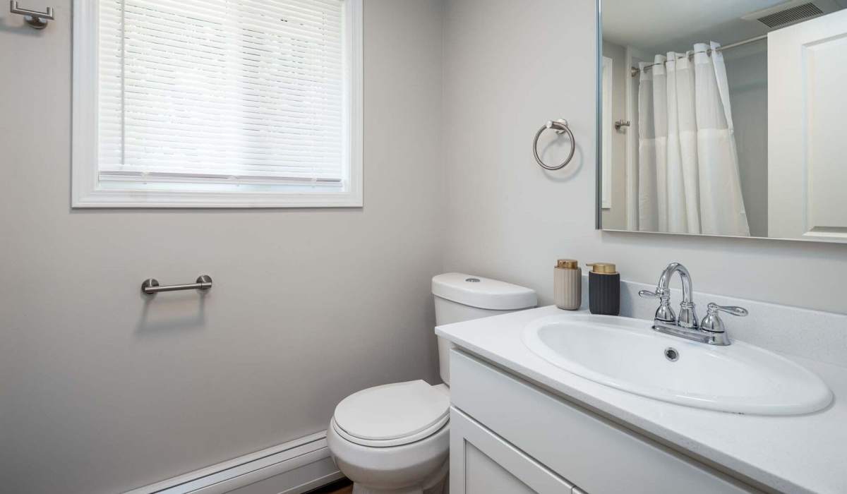 Bathroom with sink at Glenora Gardens in Rochester, New York