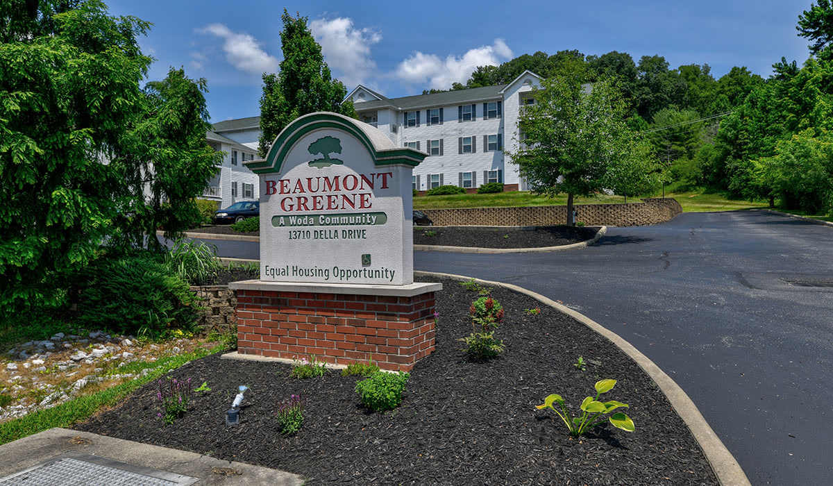 Apartment community sign at entrance near Beaumont Greene Senior Living in Athens, Ohio