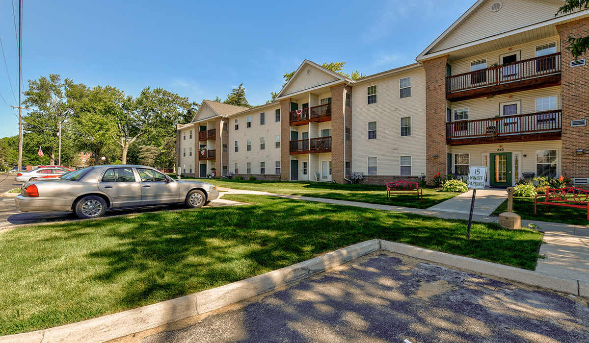 Gated entrance with landscaped grounds at Tall Trees in Tiffin, Ohio
