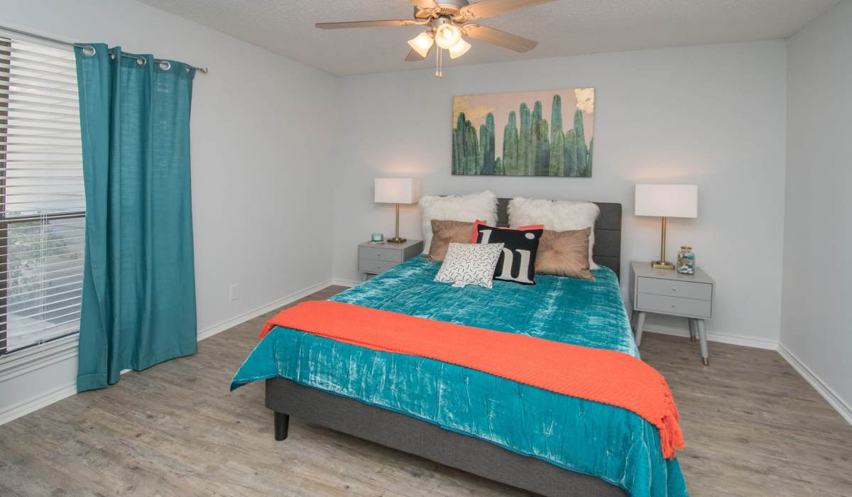Spacious bedroom with large window at The Lila at Oakgate in San Antonio, Texas