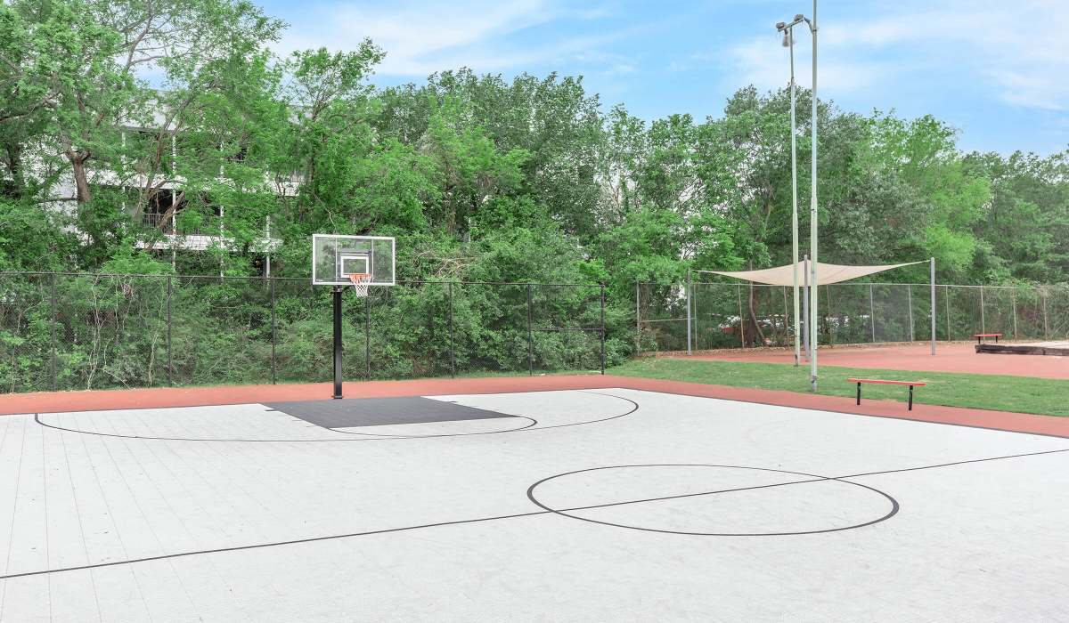 Basketball hoop with upgraded court surface at The Element in Bryan, Texas