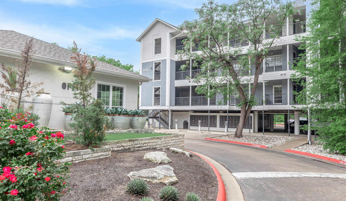 Modern apartment building with landscaping at The Element in Bryan, Texas