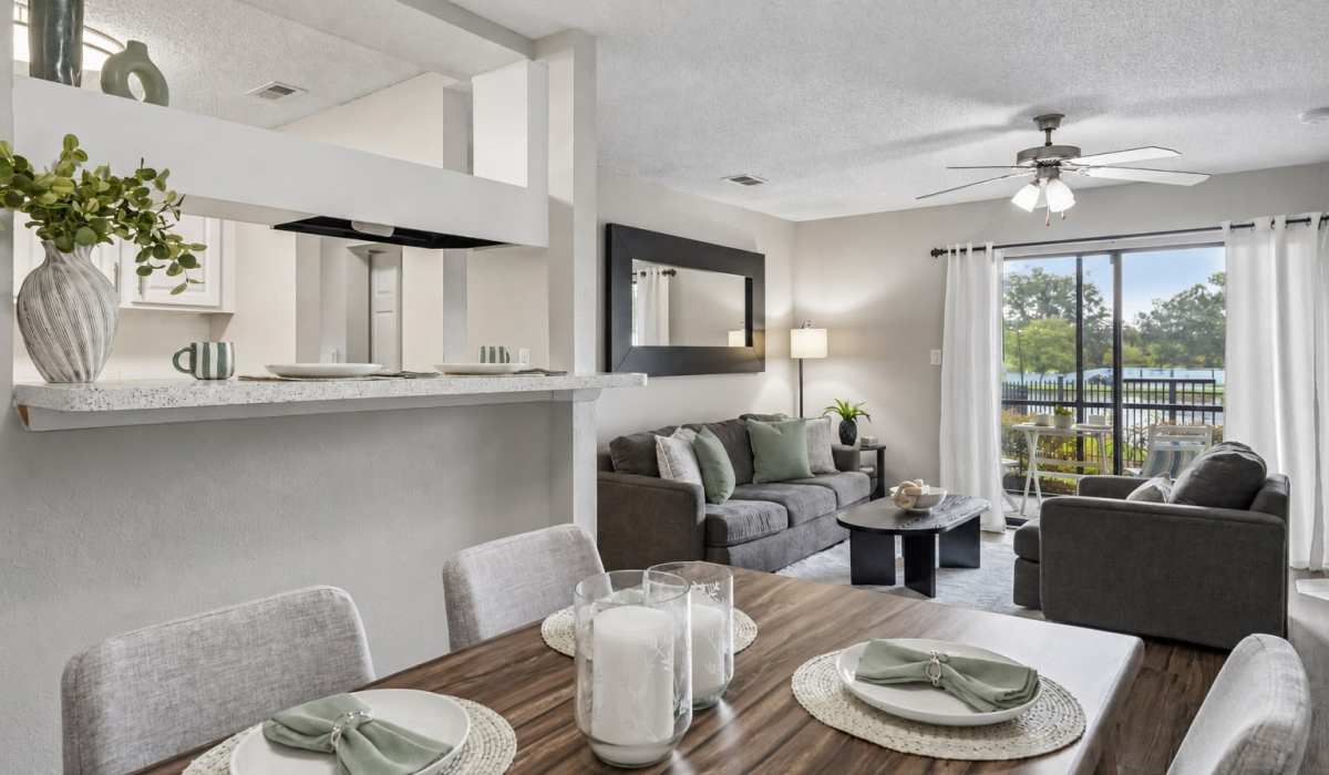 Open concept dining and living room at Waterstone At Carrollwood in Tampa, Florida