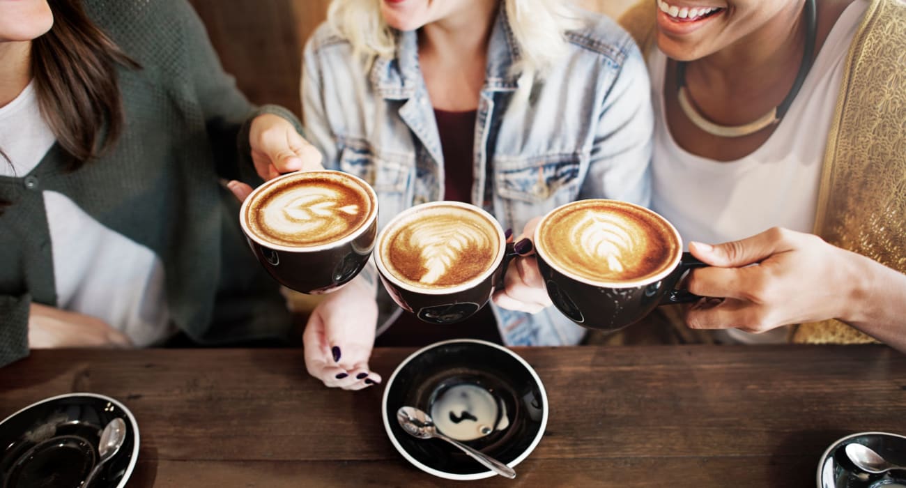 Residents enjoying coffee near Sharon Arms Apartments in Robbinsville, New Jersey