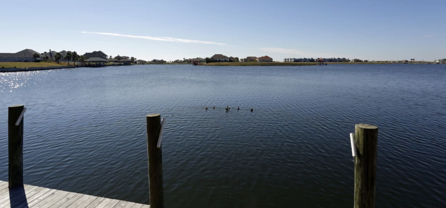 View of the lake from the fishing pier at Harborside Apartment Homes in Slidell, Louisiana