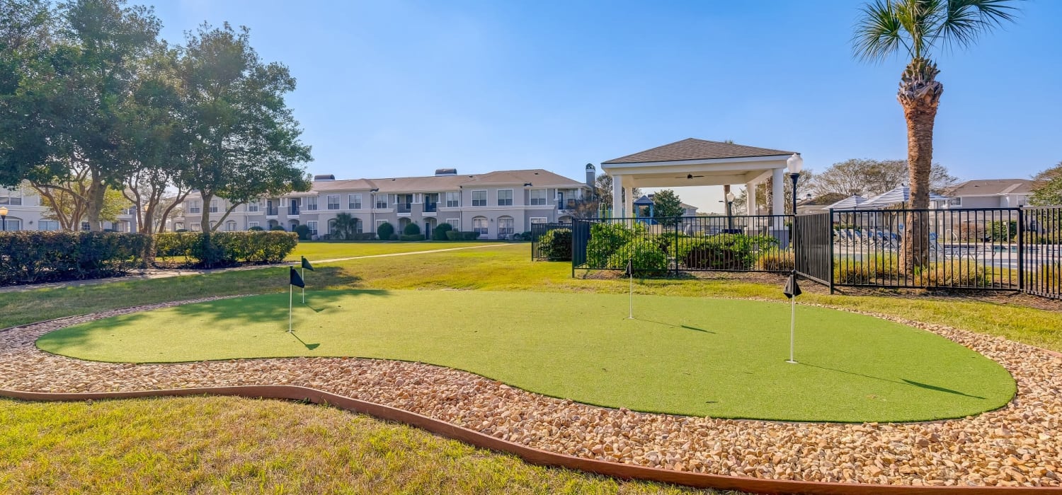 Putting area for residents at Chateau des Lions Apartment Homes in Lafayette, Louisiana