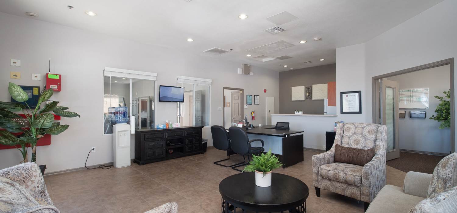 A resident relaxes in her apartment at Steeple Chase Apartments in Peoria, Arizona