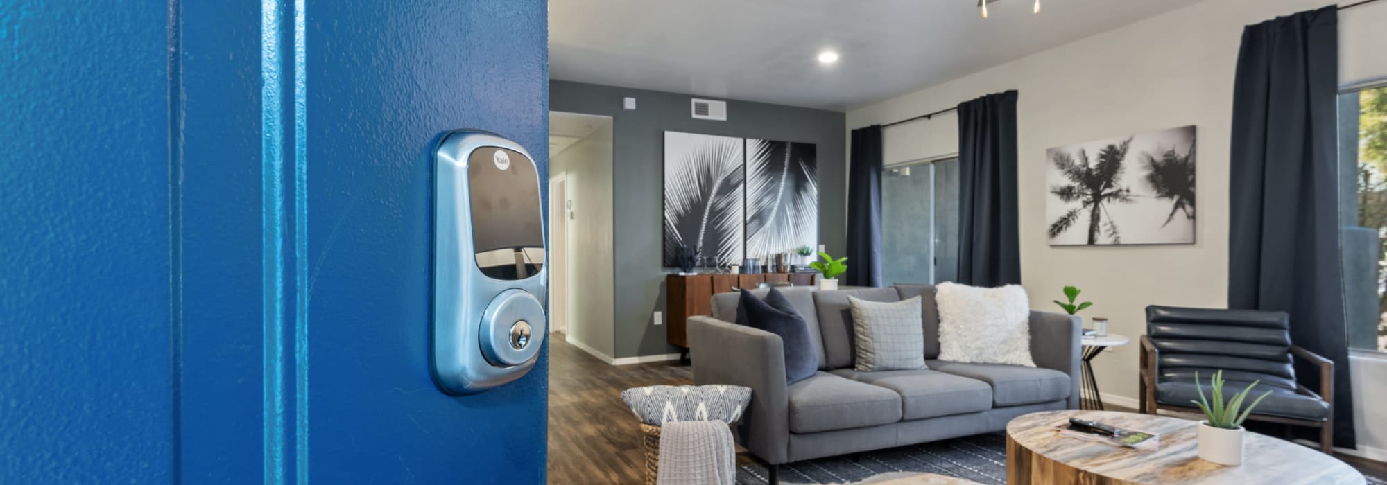 Smart lock on your door going into the living room where you can relax on the cozy couch at Fountain Hills, Arizona near Luna at Fountain Hills
