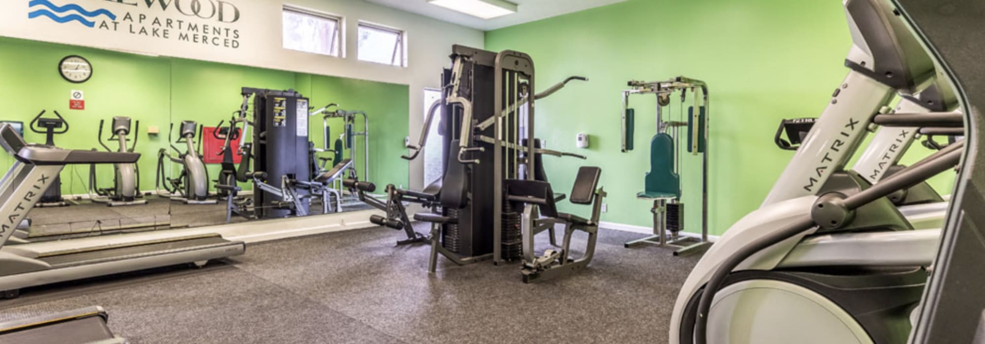 Cardio and weight lifting equipment in the fitness center at Lakewood Apartments at Lake Merced in San Francisco, California