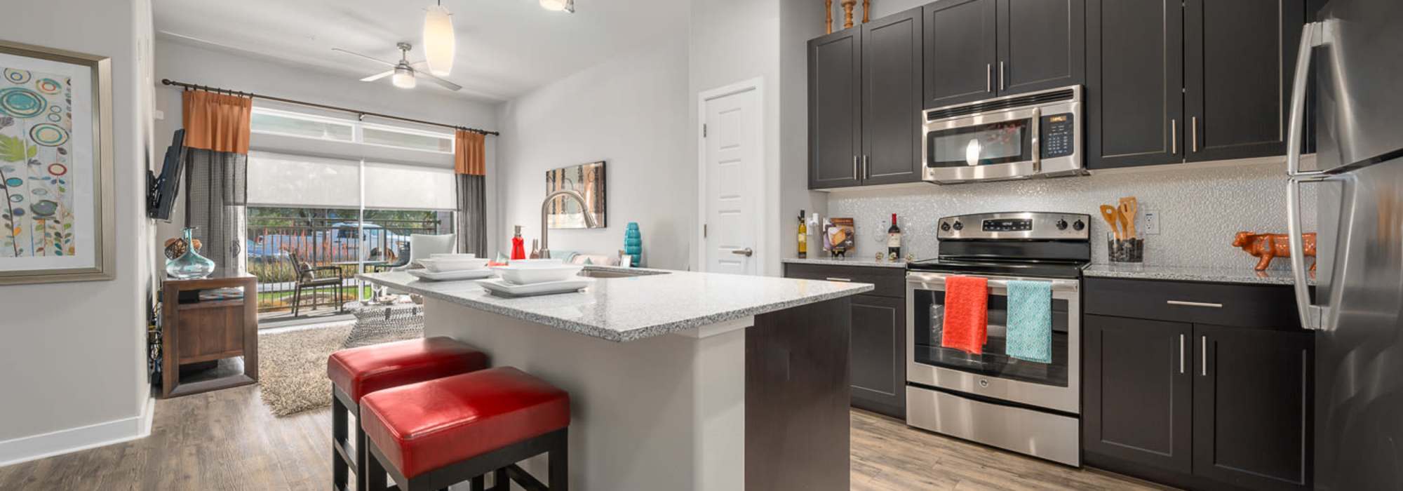 Kitchen & Living Room at The Hyve | Apartments in Tempe, Arizona