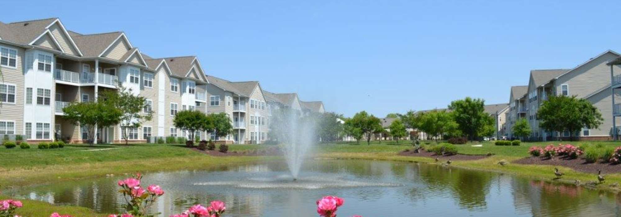 Community featuring a pond and water works at Marley Manor in Salisbury, Maryland