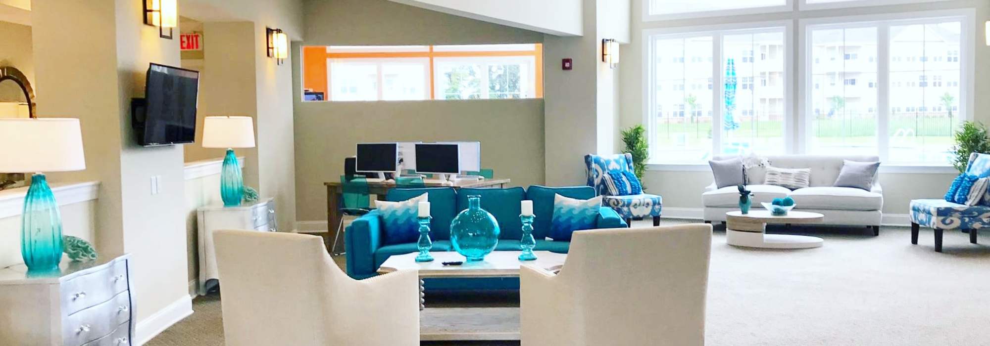 Clubhouse with community gathering areas at Leander Lakes in Dover, Delaware