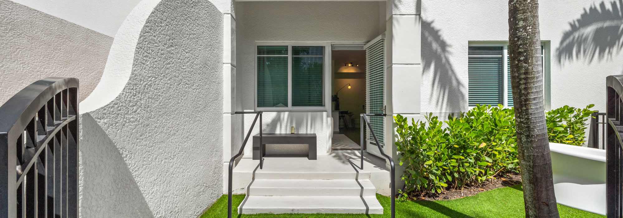 Walkway up to an apartment unit at Cordoba in Doral, Florida