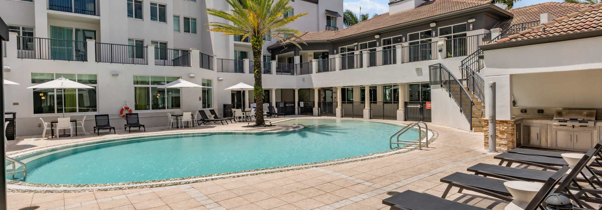 Lounge chairs by the pool at Cordoba in Doral, Florida