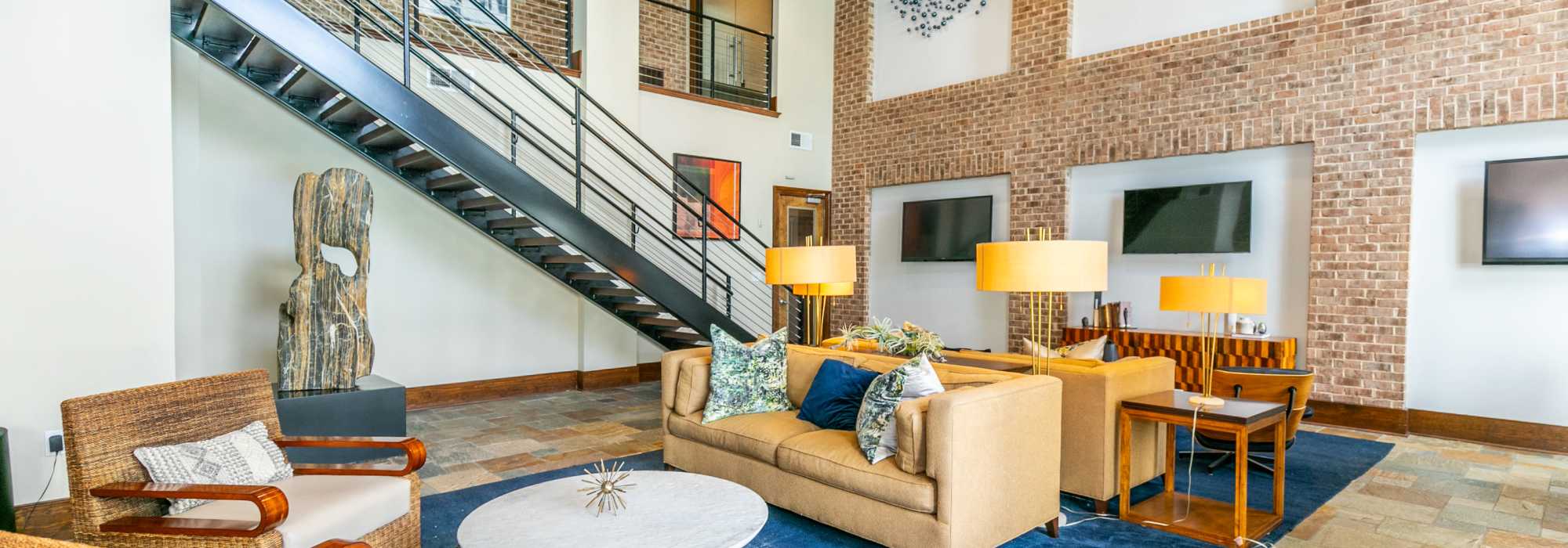 Receiving lounge with comfortable seating at Brookleigh Flats in Brookhaven, Georgia