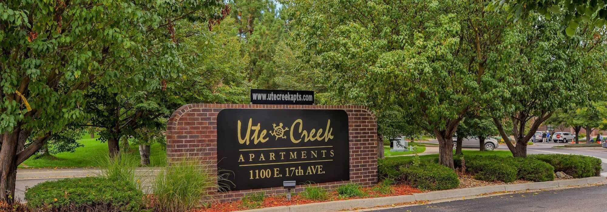 Front entrance sign at UTE Creek Apartments in Longmont, Colorado