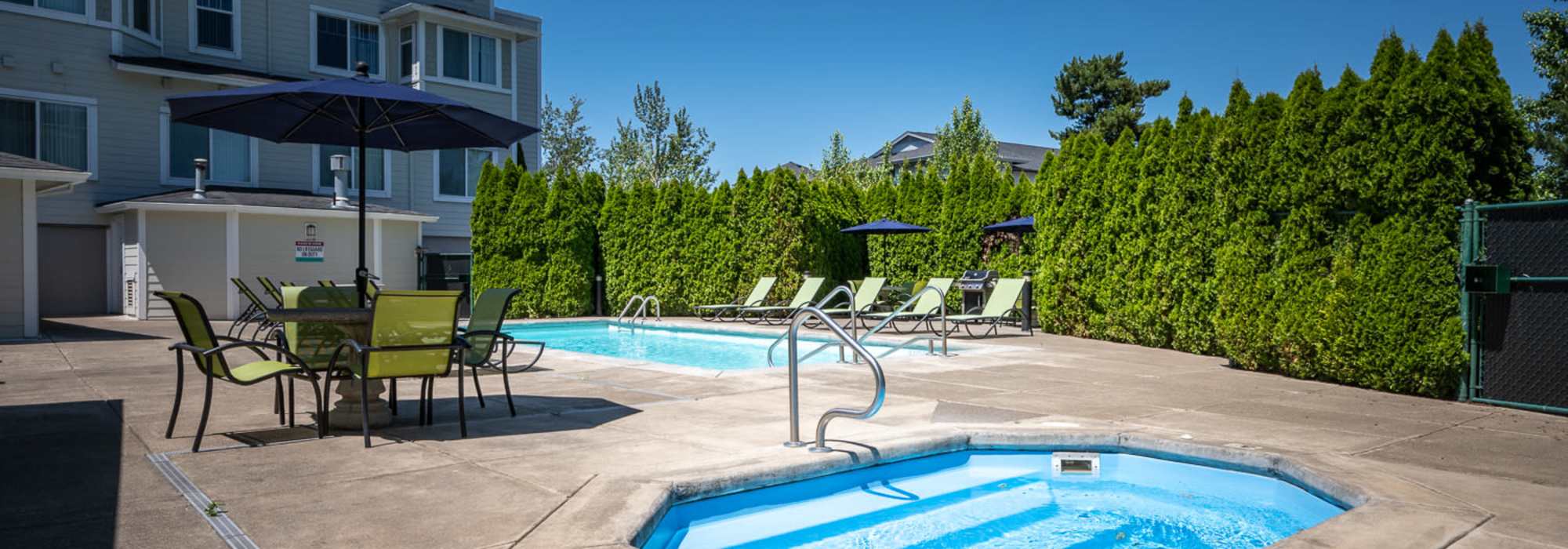 Spa area with seating area at Chinook Way Apartments in Fairview, Oregon