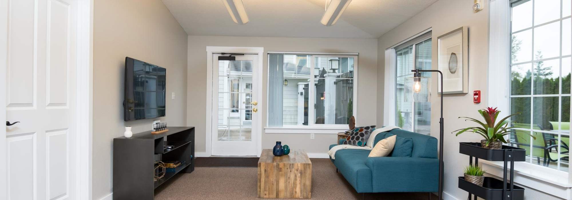 Clubhouse with beautiful ceiling light at Chinook Way Apartments in Fairview, Oregon