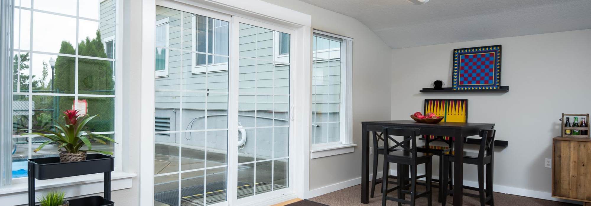 Clubhouse with view to pool at Chinook Way Apartments in Fairview, Oregon