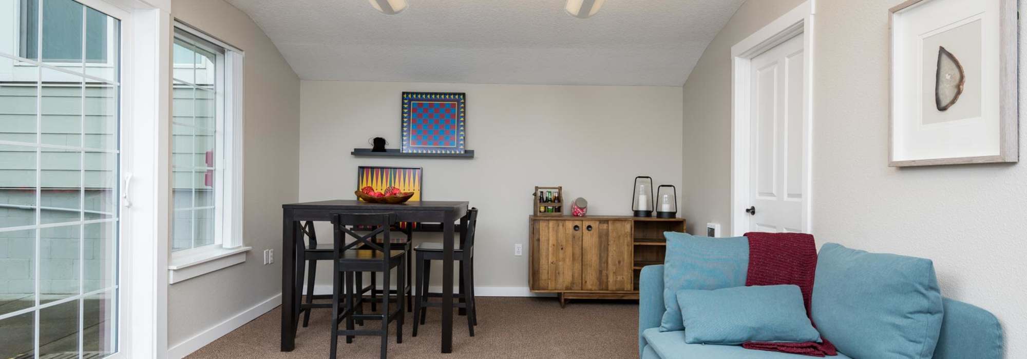 Clubhouse with beautiful wall art at Chinook Way Apartments in Fairview, Oregon