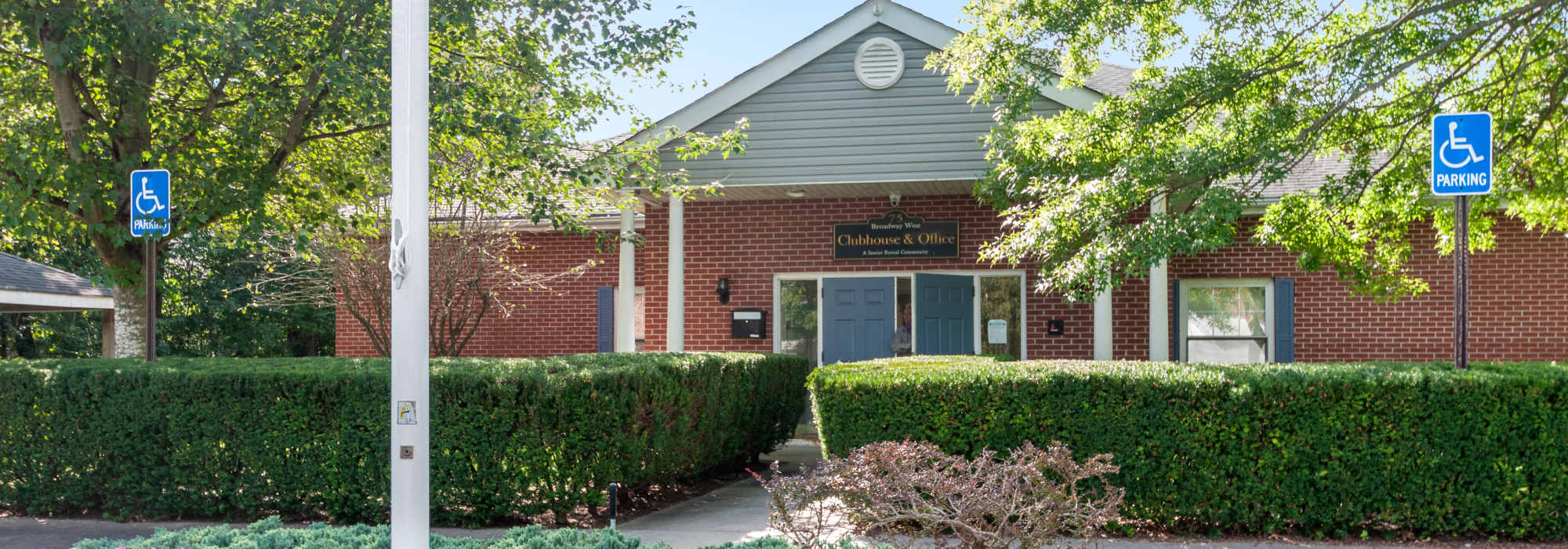 Exterior view of the apartment building at Broadway West in Brentwood, New York