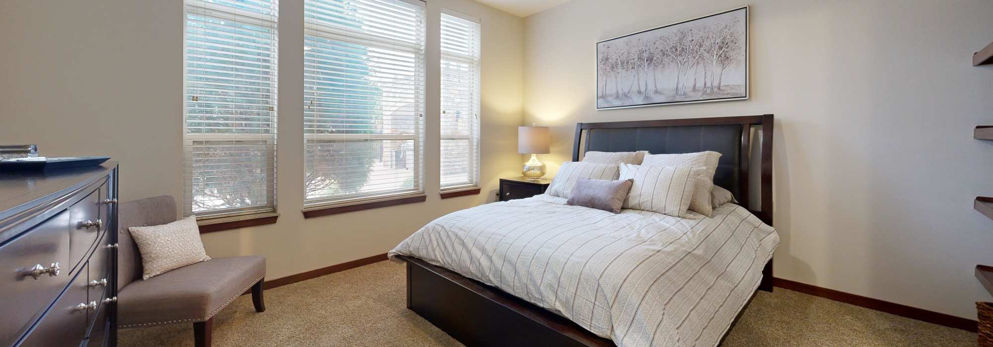 Bedroom with a window at The Tuscany On Pleasant View in Madison, Wisconsin